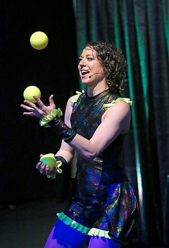 Amanda &quot;Panda&quot; Syryda, the star of the Hula Hoop Circus from Edmonton, AB., juggles a set of yellow balls as part of her early afternoon show on Monday during the first day of the Royal Manitoba Winter Fair. (Matt Goerzen/The Brandon Sun)