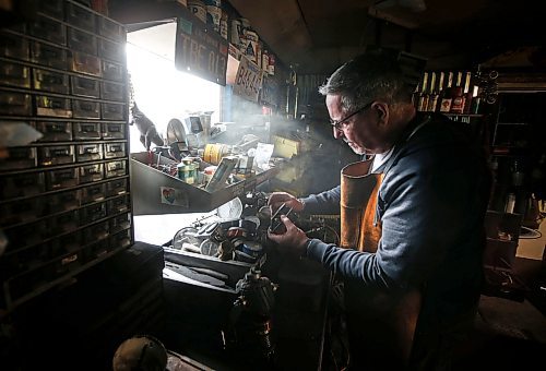 JOHN WOODS / FREE PRESS
Mike Beaudry, owner of Mad Mike Studio68, makes robot sculptures from scrap metal in his backyard workshop in West St Paul Monday, March 25, 2024. 

Reporter: Dave