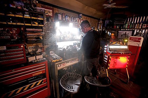 JOHN WOODS / FREE PRESS
Mike Beaudry, owner of Mad Mike Studio68, makes robot sculptures from scrap metal in his backyard workshop in West St Paul Monday, March 25, 2024. 

Reporter: Dave