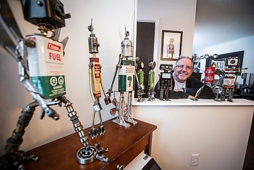 JOHN WOODS / FREE PRESS
Mike Beaudry, owner of Mad Mike Studio68, makes robot sculptures from scrap metal in his backyard workshop in West St Paul Monday, March 25, 2024. 

Reporter: Dave