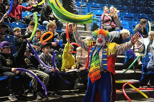 Children's entertainer Doodles the Clown whoops it up for the camera during one of his performances on Family Day at the Royal Manitoba Winter Fair. (Michele McDougall/The Brandon Sun)
