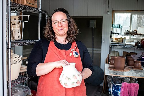 MIKAELA MACKENZIE / FREE PRESS

Megan Morin, a potter who makes forest-inspired creations, holds a bisque-fired piece in her studio near Richer on Monday, March 25, 2024. 

For AV story.