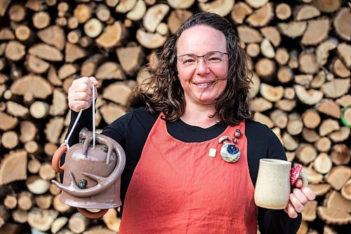 MIKAELA MACKENZIE / FREE PRESS

Megan Morin, a potter who makes forest-inspired creations, shows a finished garden bell and mug on her property near Richer on Monday, March 25, 2024. 

For AV story.