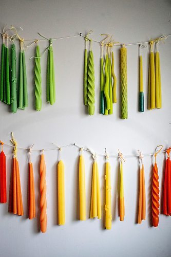 MIKAELA MACKENZIE / FREE PRESS

Lynsey Sable&#x573; candles, which use locally sourced beeswax and natural dyes, hang in her studio in La Broquerie on Monday, March 25, 2024. 

For AV story.