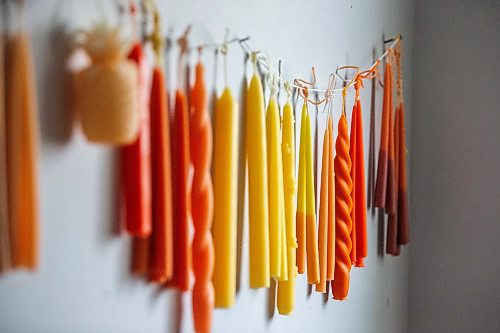 MIKAELA MACKENZIE / FREE PRESS

Lynsey Sable&#x573; candles, which use locally sourced beeswax and natural dyes, hang in her studio in La Broquerie on Monday, March 25, 2024. 

For AV story.