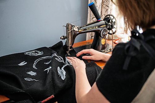 MIKAELA MACKENZIE / FREE PRESS

Lino printer Amanda Fyfe sews on her trundle sewing machine in her home in Richer on Monday, March 25, 2024. 

For AV story.