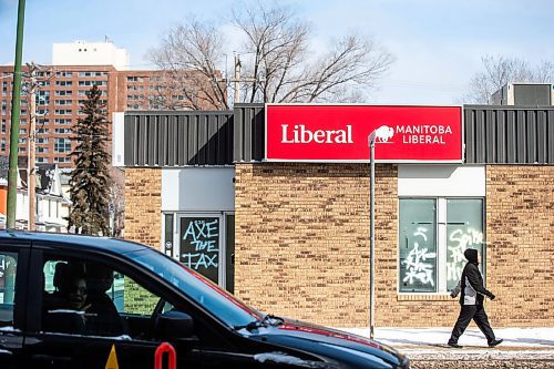 MIKAELA MACKENZIE / FREE PRESS

Graffiti reads &#x201c;axe the tax&#x201d; and &#x201c;spike the hike&#x201d; on the windows and doors of the Manitoba Liberal Party office on Broadway on Wednesday, March 27, 2024. 