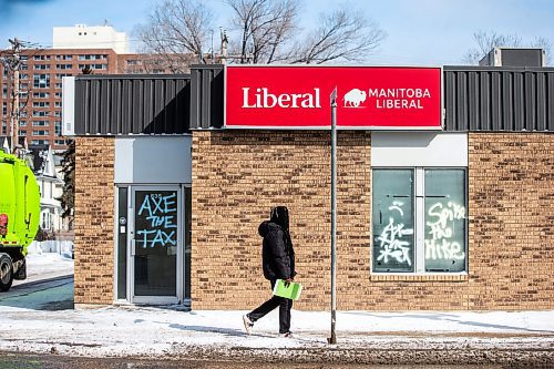 MIKAELA MACKENZIE / FREE PRESS

Graffiti reads &#x201c;axe the tax&#x201d; and &#x201c;spike the hike&#x201d; on the windows and doors of the Manitoba Liberal Party office on Broadway on Wednesday, March 27, 2024. 