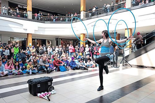Ruth Bonneville / Free Press

Standup  - Festival of Fools

Sarah Teakle, one of the top &quot;circus style&quot; hula hoop performers in Canada, performs  in front of a large, young crowd of fans in the centre court at CF Polo Park Wednesday.

Teakle is just one of several artists performing during the Festival of Fools, Winnipeg International Childrens Festival at the mall for Spring Break this week. Shows run  at10am. 1pm and 2pm daily till Friday. 

March 27th, 2024
