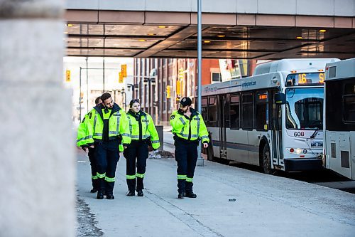 MIKAELA MACKENZIE / FREE PRESS

Transit safety officers walk down Graham Avenue on their first day on the job on Tuesday, Feb. 20, 2024. 

For Chris story.
