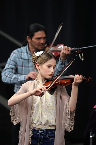 Nine-year-old Savery Hatch plays the Spotted Pony during the Fiddler's Contest in the Manitoba Hydro Amphitheatre on Wednesday night during the Royal Manitoba Winter Fair. (Matt Goerzen/The Brandon Sun)