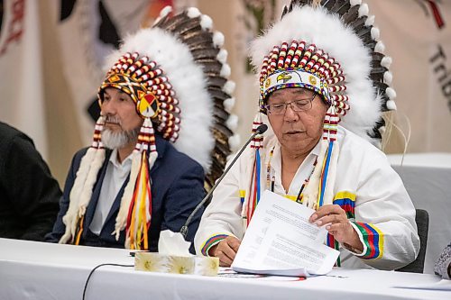 BROOK JONES / FREE PRESS
Keewatin Tribal Council Grand Chief Walter Wastesicoot looks over document regarding a KTC declaration towards self determination during a media conference at the Victoria Inn in Winnipeg, Man., Thursday, March 28, 2024. Eleven first nations are affiliated under the KTC. Pictured on the left is York Factory First Nation Chief Daryl Wastesicoot.
