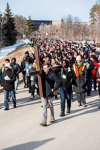 MIKAELA MACKENZIE / FREE PRESS

Justin Mall (front) and Paul Bahiga lead the Way of the Cross procession to the second station of the cross at the University of Manitoba on Friday, March 29, 2024. This is the first year that the event has been held on a university campus.

For Katie story.