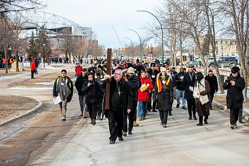 MIKAELA MACKENZIE / FREE PRESS

Archbishop Richard Gagnon leads the Way of the Cross procession from Christ the King Chapel at the University of Manitoba on Friday, March 29, 2024. This is the first year that the event has been held on a university campus.

For Katie story.