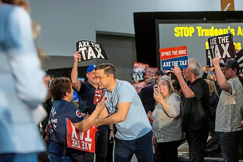 BROOK JONES / FREE PRESS
Conservative Party of Canada Leader Pierre Poilievre (baby blue colour T-shirt) meets with supporters during his 'Spike the Hike - Axe the Tax' rally at the RBC Convention Centre in Winnipeg, Man., Thursday, March 28, 2024.