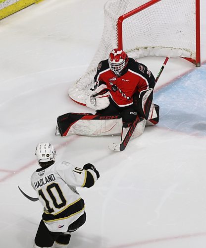 Moose Jaw Warriors goalie Jackson Unger (30) squares to Brandon Wheat Kings shooter Caleb Hadland (10) and makes a save during Game 2 of their best-of-seven Western Hockey League quarterfinal playoff series at Moose Jaw Events Centre on Saturday. (Perry Bergson/The Brandon Sun)
March 30, 2024