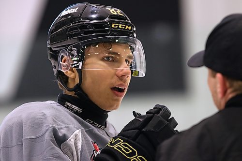 Brandon Wheat Kings forward Dominik Petr, shown talking to assistant coach Mark Derlago at a recent practice at J&amp;G Homes Arena, has been proud of his play during his first season in North America. (Perry Bergson/The Brandon Sun)
April 5, 2024
