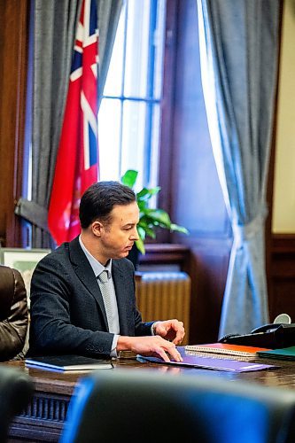 MIKAELA MACKENZIE / FREE PRESS

New Finance minister Adrien Sala signs documents in his office at the Manitoba Legislative Building on Thursday, March 28, 2024. 

For Dan story.