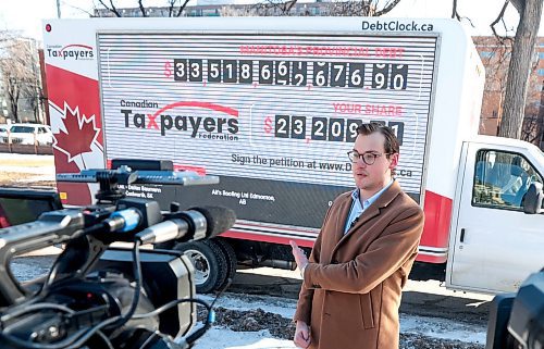 Ruth Bonneville / Free Press

LOCAL - tax fed

Gage Haubrich with The  Canadian Taxpayers Federation talks to the media about the Debt Clock next to the Manitoba Legislature, to sound the alarm about the growing provincial debt and its consequences, Monday.  

The Video truck with huge digital screen showing provincial debt going up in real time and the share of the debt with each citizen, including children, will be parked near the Legislative grounds as  the Manitoba NDP Government announce their budget Tuesday/ 


April 1st, 2024
