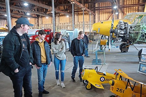 01042024
Andrew Hayter (L) gives friends Jonas Kusmizkij, Mikayla Cox and Tyson Andrew a tour of the Commonwealth Air Training Plan Museum on Monday afternoon during a free open house for the grand re-opening of the museum. The museum also celebrated the 100th anniversary of the Royal Canadian Air Force. Hayter&#x2019;s father, Stephen Hayter, is the Executive Director for the museum.
(Tim Smith/The Brandon Sun)