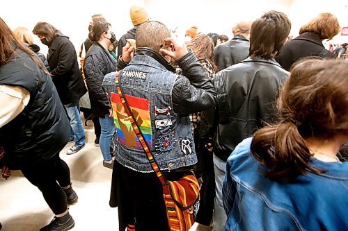 JOHN WOODS / WINNIPEG FREE PRESS
A Ramones fan adjusts her fake ears at the inaugural Winnipeg Punk Rock Flea Market in Valour Community Centre Sunday, April 2, 2023. 

Re: ?