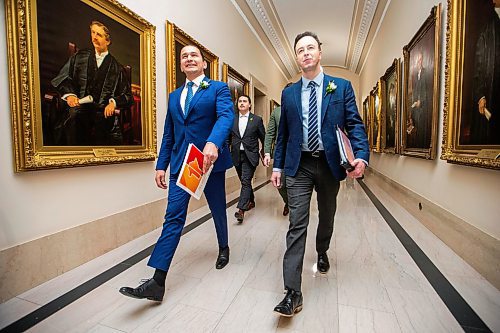 MIKAELA MACKENZIE / FREE PRESS

Premier Wab Kinew and finance minister Adrian Sala walk in to speak to the media on budget day at the Manitoba Legislative Building on Tuesday, April 2, 2024. 

For budget story.