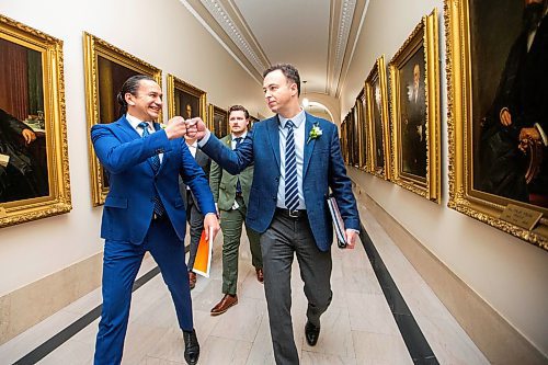 MIKAELA MACKENZIE / FREE PRESS

Premier Wab Kinew and finance minister Adrian Sala fist bump before walking in to speak to the media on budget day at the Manitoba Legislative Building on Tuesday, April 2, 2024. 

For budget story.