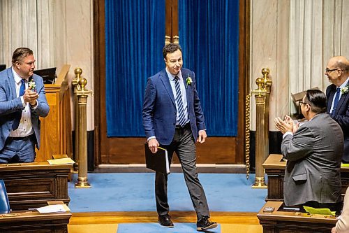MIKAELA MACKENZIE / FREE PRESS

Finance minister Adrian Sala is applauded as he walks into the chamber on budget day at the Manitoba Legislative Building on Tuesday, April 2, 2024. 

For budget story.