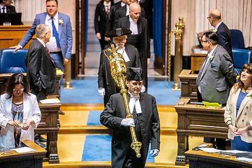 MIKAELA MACKENZIE / FREE PRESS

The sergeant-at-arms carries the mace into the chamber on budget day at the Manitoba Legislative Building on Tuesday, April 2, 2024. 

For budget story.