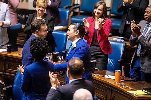 MIKAELA MACKENZIE / FREE PRESS

Finance minister Adrian Sala shakes hands with premier Wab Kinew in the chamber on budget day at the Manitoba Legislative Building on Tuesday, April 2, 2024. 

For budget story.