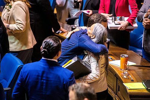 MIKAELA MACKENZIE / FREE PRESS

Finance minister Adrian Sala hugs families minister Nahanni Fontaine in the chamber on budget day at the Manitoba Legislative Building on Tuesday, April 2, 2024. 

For budget story.