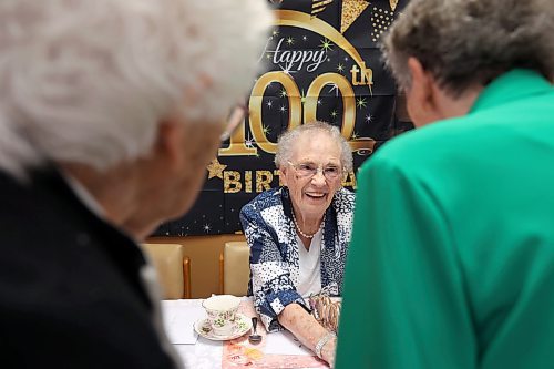 02042024
Hobbs Manor resident Grace Bell visits with friends, family and well-wishers during a party for her 100th birthday on Tuesday. Bell officially turns 100 on April 4th, making her Hobbs Manor&#x2019;s oldest resident. Bell lived her entire life in the Elgin area prior to moving into Hobbs Manor, where she has lived for the past 23 years. A large crowd celebrated her birthday with cake and tea.
(Tim Smith/The Brandon Sun)