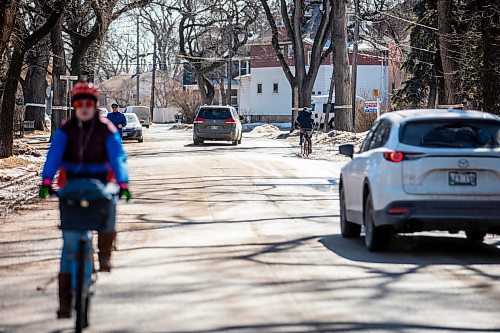 MIKAELA MACKENZIE / FREE PRESS

Cars, pedestrians, and cyclists on Wolseley Avenue on Wednesday, April 3, 2024. A city report calls to make Wolseley Avenue a permanent neighbourhood greenway, which means it&#x2019;s speed will drop to 30 km/h, year round, seven days a week.

For Joyanne story.
