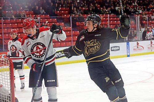 03042023
Roger McQueen #13 of the Brandon Wheat Kings celebrates a goal by teammate Matteo Michels #88 during the first period of game three of first round playoff action against the Moose Jaw Warriors at Westoba Place on Wednesday evening. 
(Tim Smith/The Brandon Sun)