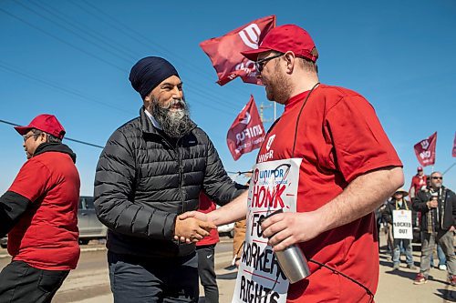 BROOK JONES / FREE PRESS
Canada's NDP Leader Jagmeet Singh (left) shakes hands with Ryan Schultz, 32, who has been working for Griffin Wheel Company for two years. He was on the picket line with fellow  workers, Unifor Local 144, while they fight for fair benefits and pensions. Singh was pictured with striking workers from this train wheel manufacturing plant in Winnipeg, Man., Thursday, April 4, 2024.