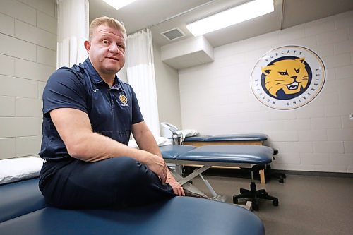 Brandon University Bobcats athletic therapist Schad Richea poses for a shot in the Healthy Living Centre's medical clinic on Friday. (Matt Goerzen/The Brandon Sun)