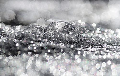 Bubbles glinting in the bright sunshine go with the flow on top of meltwater in a ditch down Grandvalley Road west of Brandon on Friday morning. (Matt Goerzen/The Brandon Sun)