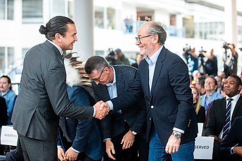 MIKAELA MACKENZIE / FREE PRESS

Premier Wab Kinew (left) shakes hands with True North Real Estate Development president Jim Ludlow at a press conference announcing new redevelopment details at Portage Place on Friday, April 5, 2024.

For Chris story.