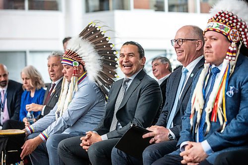 MIKAELA MACKENZIE / FREE PRESS

Premier Wab Kinew and mayor Scott Gillingham share a laugh before a press conference announcing new redevelopment details at Portage Place on Friday, April 5, 2024.

For Chris story.
