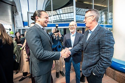 MIKAELA MACKENZIE / FREE PRESS

Premier Wab Kinew (left) greets Jim Ludlow and Mark Chipman before a press conference announcing new redevelopment details at Portage Place on Friday, April 5, 2024.

For Chris story.