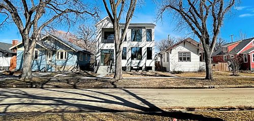 Ruth Bonneville / Free Press

Local - Infill housing 

A large, newly built two-storey home towers above small bungalows on Beaverbrook Street.

  
April 5th,  2024
