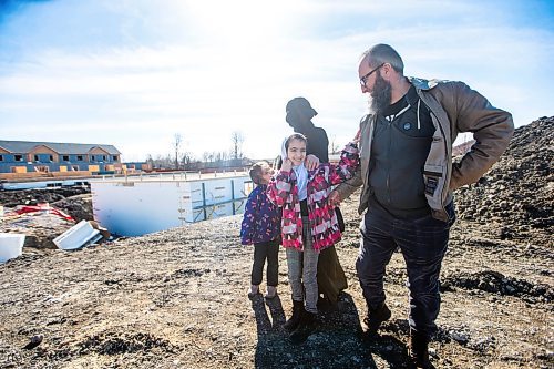 MIKAELA MACKENZIE / FREE PRESS

Zainab (five, left), Halima (nine), Eljifa, and Aslan Sejdi take a look at where their suite will be in the under-construction Habitat for Humanity housing development that they will be moving into in Transcona on Friday, April 5, 2024. Six in 10 Winnipeggers are in favour of the city&#x573; decision late last year to loosen zoning laws that would allow four housing units be built on a what was typically a single residential lot.

For Kevin story.
