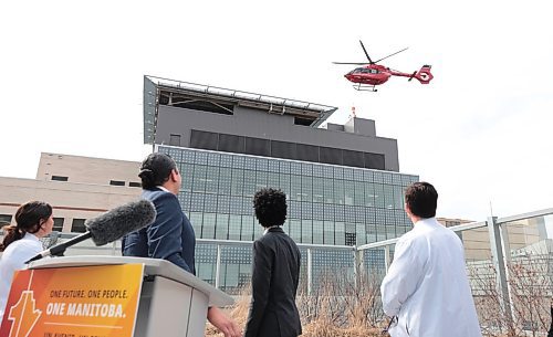 Ruth Bonneville / Free Press

Local - Health Presser 

Premier Kinew, Minister Asagwara and other speakers stop to watch the air ambulance helicopter land on the roof of HSC during presser Monday. 

Premier Wab Kinew and Health Minister Uzoma Asagwara, hold press conference on adding capacity at Health Sciences Centre Winnipeg, on the terrace at Women&#x573; Hospital, Health Sciences Centre Monday. 

Also in attendance:
Dr. Manon Pelletier Chief Medical Officer.HSC and Dr Shawn Young Chief Operating Office HSC. 


  
April 8th,  2024
