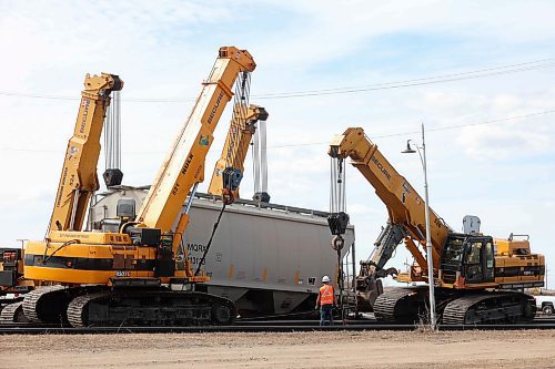 Crews work on cleanup and repairs on Monday afternoon after 13 train cars carrying sand derailed at the CN yard in Rivers on Sunday around 7 p.m. The CN main line was not affected in the derailment. The cause is still under investigation. (Tim Smith/The Brandon Sun)