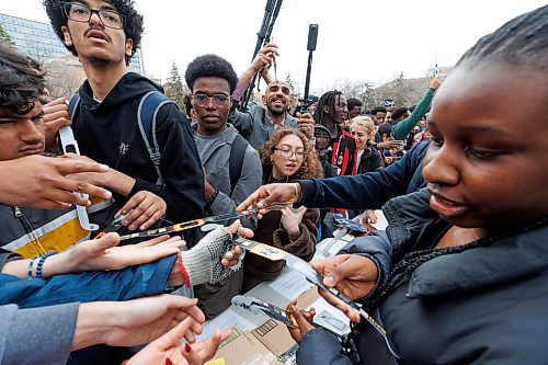 MIKE DEAL / FREE PRESS
Students gather on the Quad at the University of Manitoba to collect free viewing glasses and watch the partial solar eclipse during an overcast Monday afternoon.
240408 - Monday, April 08, 2024.