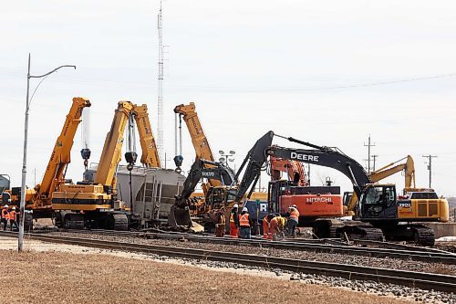 08042024
Crews work on clean up and repairs on Monday afternoon after approximately a dozen train cars carrying sand derailed at the CN yard in Rivers, Manitoba on Sunday evening. The CN main line was not affected in the derailment. 
(Tim Smith/The Brandon Sun)