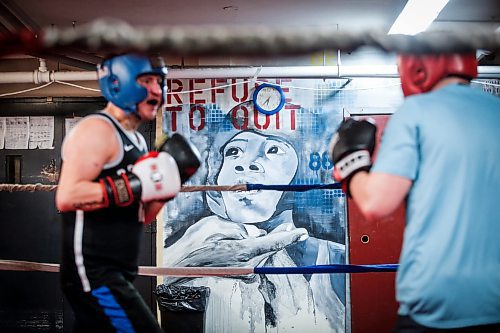 JOHN WOODS / FREE PRESS
Boxers spar in front of a motivational sign at Pan Am Place, a half-way house for men, Tuesday, April 8, 2024. 

Reporter: conrad