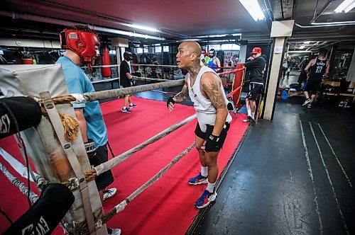 JOHN WOODS / FREE PRESS
Michael McMillan, left, listens to some ringside coaching from Chris Sarifa, co-manager, right, as he trains at Pan Am Place, a half-way house for men, Tuesday, April 8, 2024. 

Reporter: conrad