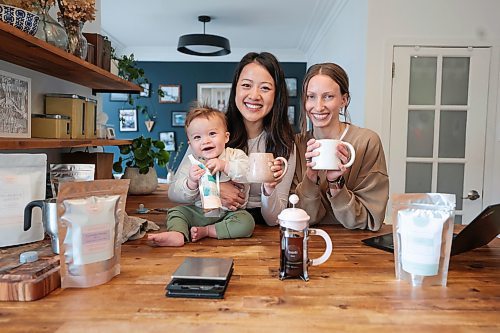 Ruth Bonneville / Free Press

49.8 - INTERSECTION  Toasti bean infused coffee 

Photos of Hayley Johnston (brown sweater, bun) and her business partner Thao Lam with her young son, Teo (10 months old), showing off their variety of brews.  

Also shots sealing bags of coffee in their commercial kitchen in Hayley's garage  which was renovated and licensed for their business use.  

Story: This is for an Intersection piece on Toasti Bean Infused Coffee, the gals' &quot;COVID project.&quot; The two met in university over 12 years ago, and got together daily for their morning coffee. After being forced to work from home during the pandemic, each missed their daily caramel macchiato, so they began experimenting with diff spices &amp; extracts, to create their own flavours of coffee. (Infused coffee involves mixing spices etc. with ground, roasted beans and allowing everything to settle, before brewing.

They soon launched Toasti Bean in the fall of 2020. Today they're up to over 20 flavours (blueberry pancake coffee, anyone?) and will be at markets almost every weekend this month.

The commercial kitchen they use is Hayley's garage - she renovated and had it licensed.

For the Apr 13 Intersection.

Story by Dave.

April 10th,  2024
