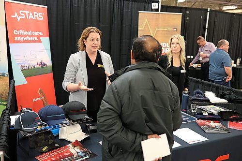 10042024
Community Engagement Officer Tracy Mowdy and Donor Relations and Development Officer Angele Cuthbertson, talk to a visitor to the STARS booth at the 2024 Association of Manitoba Municipalities Spring Convention at the Keystone Centre on Wednesday. 
(Tim Smith/The Brandon Sun)